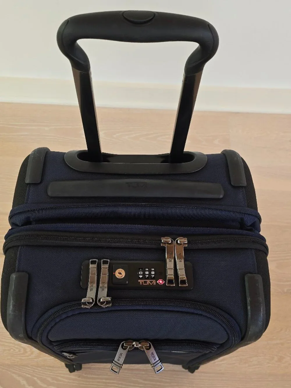 TUMI Alpha 3 International Dual Access 4-Wheeled Carry-On Spinner Luggage in Nav